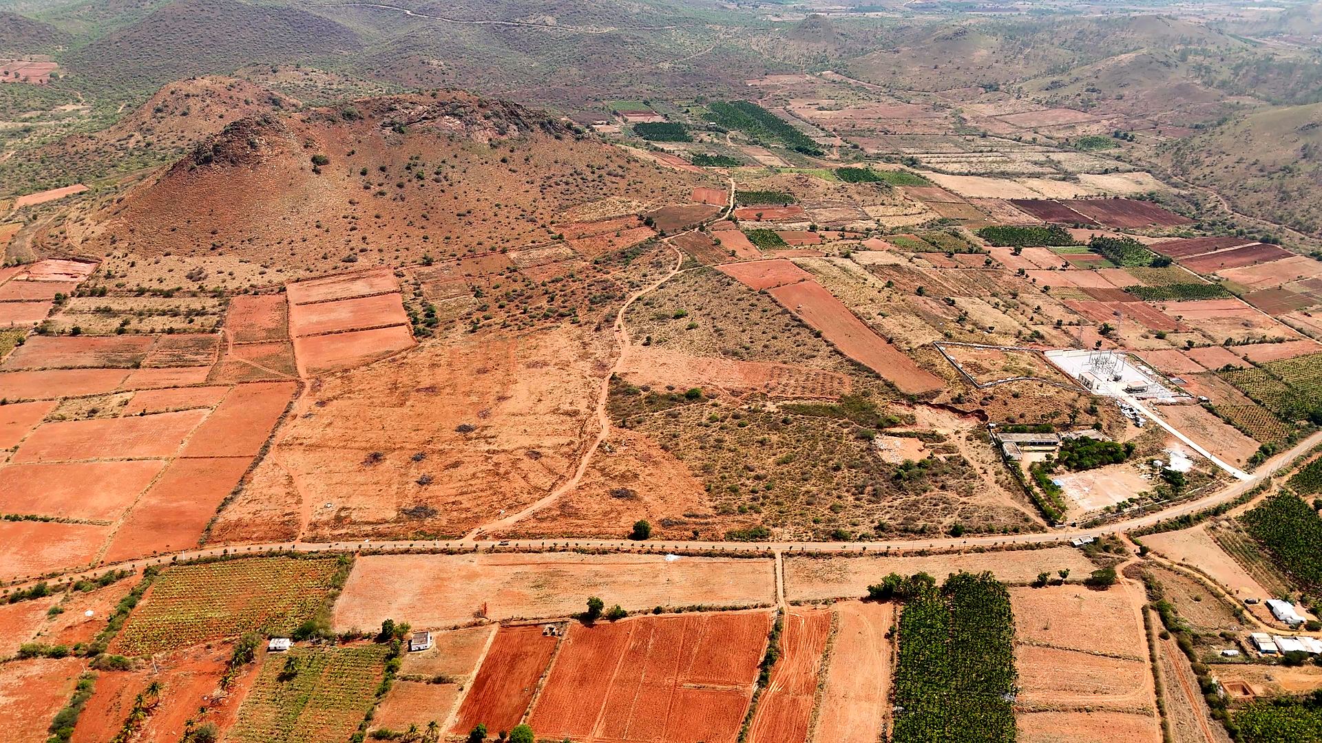 Wide aerial view of the Ekrej solar land parcel in Chitradurga, Karnataka